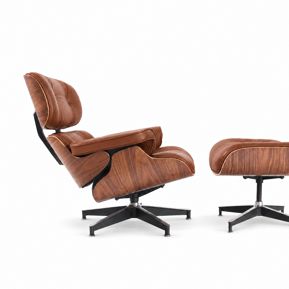Mid-century lounge chair and ottoman in cognac brown full-grain leather with walnut veneer, side view